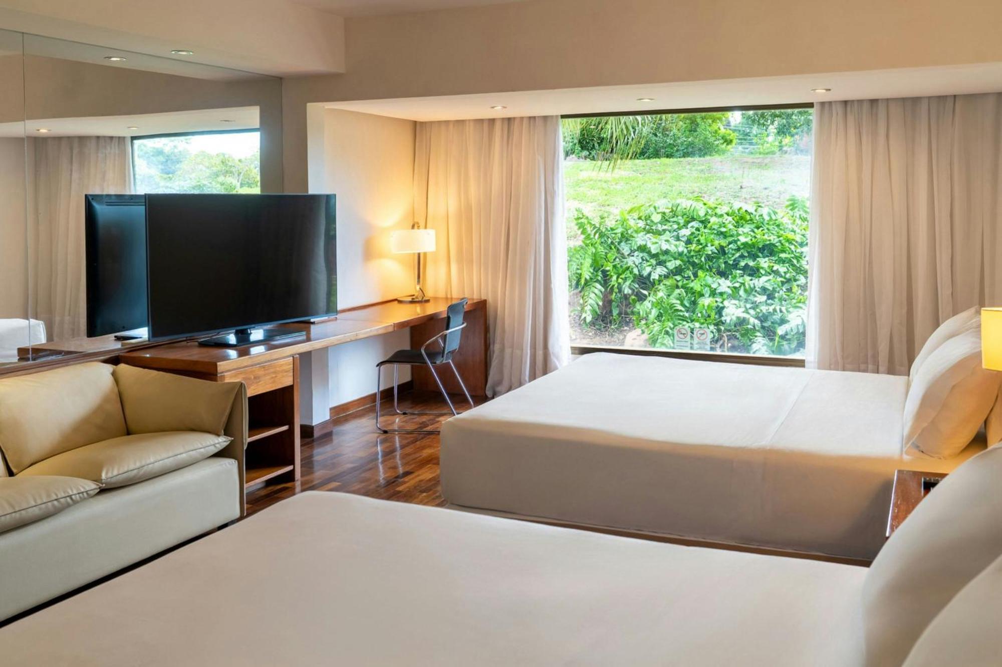 Deluxe Queen Room with Two Queen Beds and Garden View